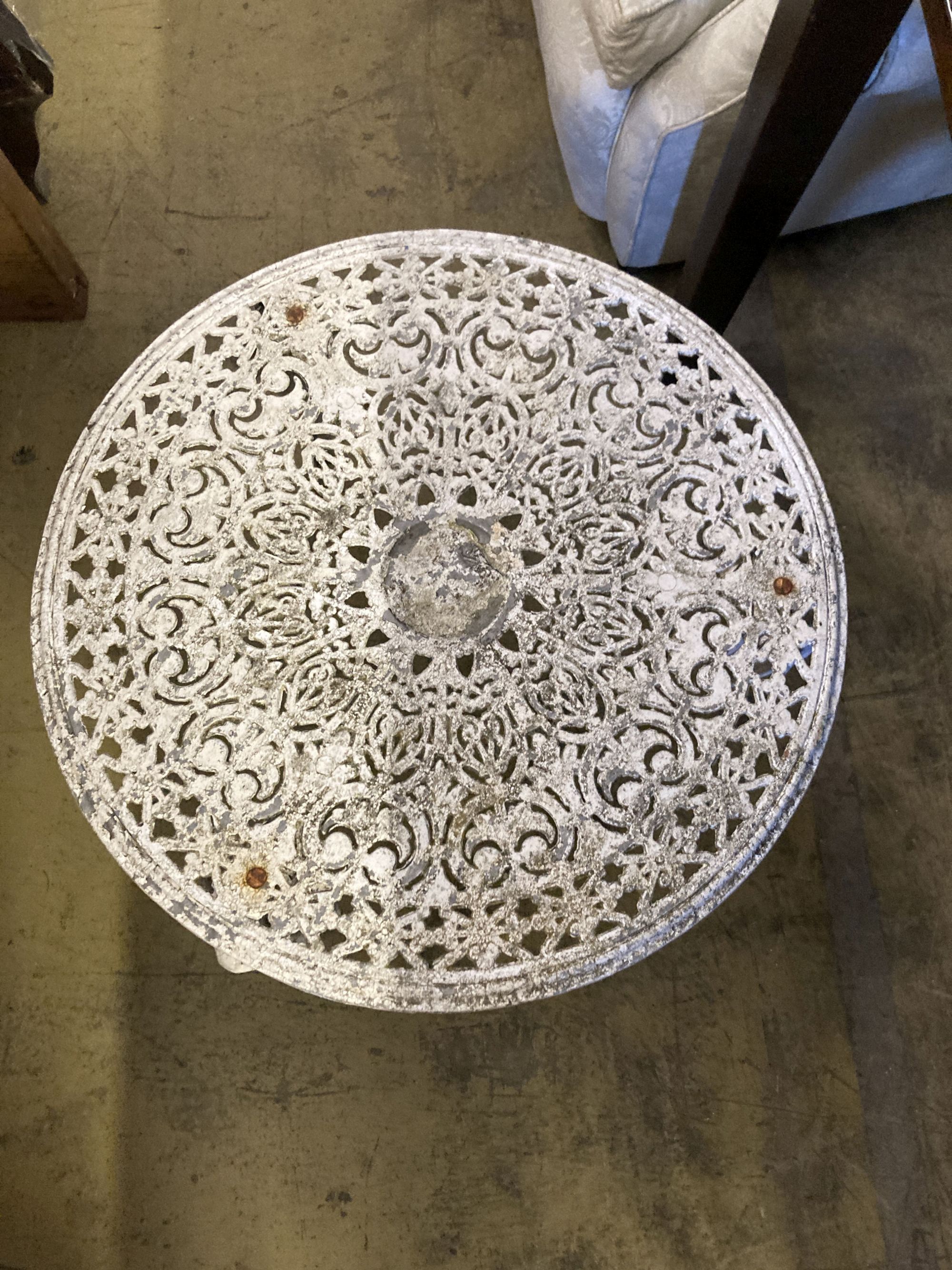 A pair of painted circular aluminium garden tables, larger 61cm diameter, height 44cm